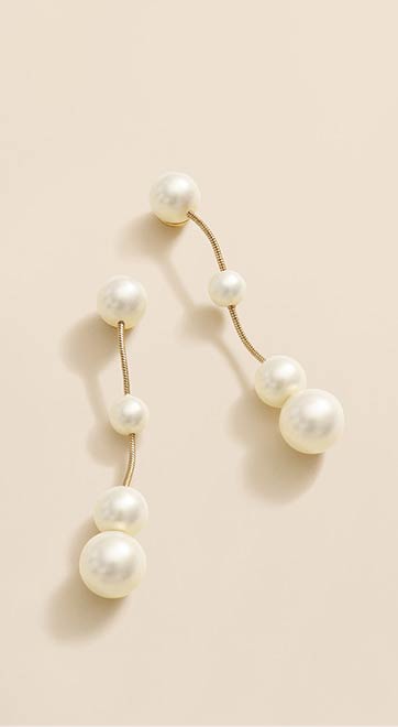 A Beautiful Finish: The little pieces that take her looks to the next level.